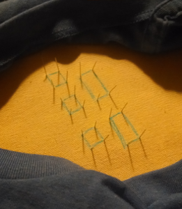 Backside of working fabric, with lines drawn connecting the points delineated by the straight pins placed in previous photos