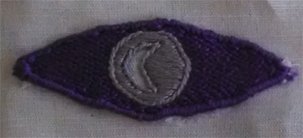 The logo element is completed and has been sewn onto yet more linen.