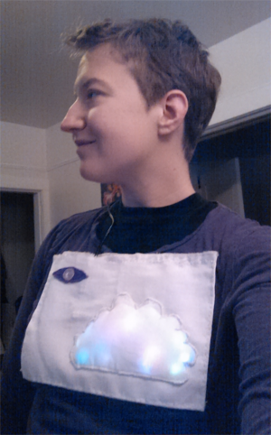 The author wearing a T-shirt with a glowing cloud design